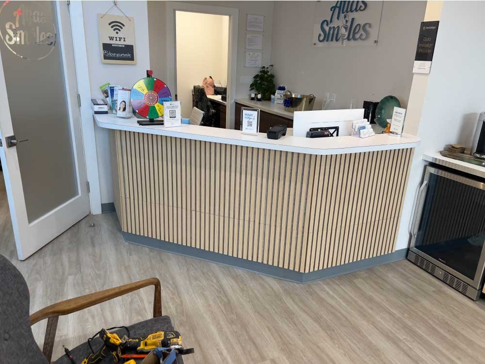 Dental office reception desk built during a commercial remodel