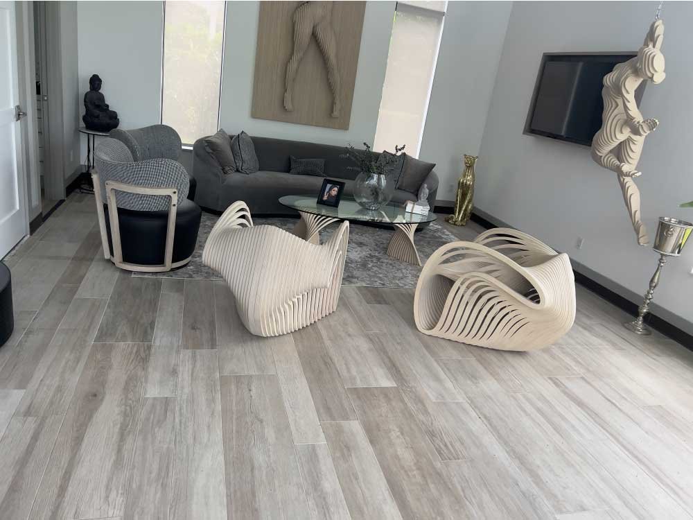 Living room with new wood-look flooring after a home improvement project