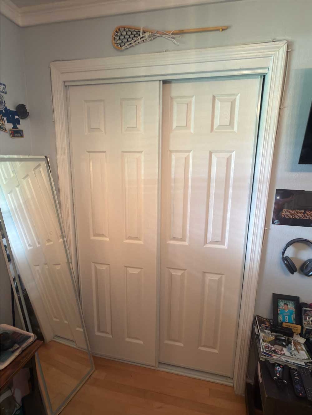New sliding closet doors installed in a bedroom